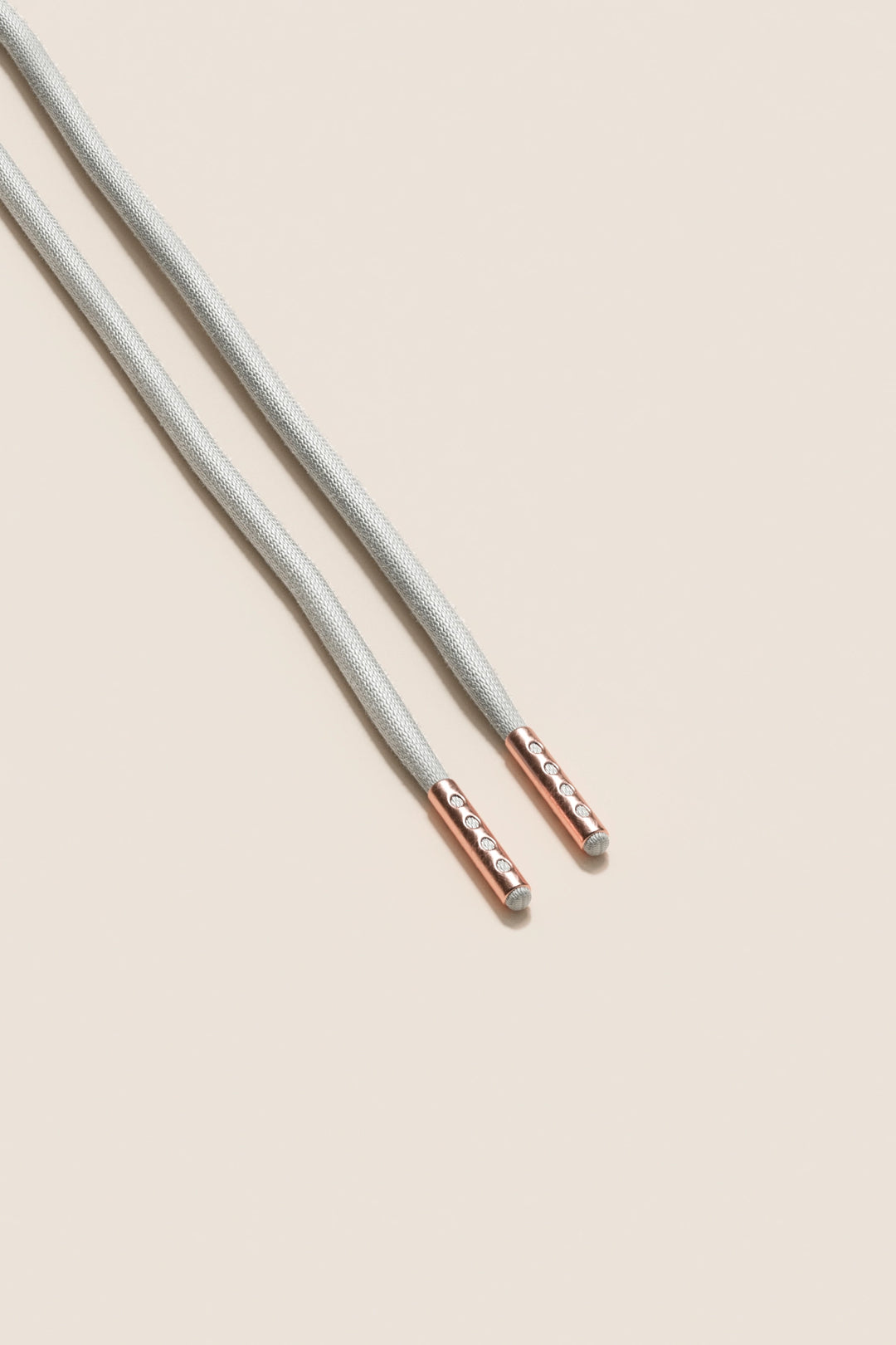 Senkels Light Grey 4mm Round Waxed Shoelaces with Rose Gold Aglets